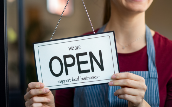 8 Questions Small Business Owners Should Ask Their Attorney open sign in the window of a business
