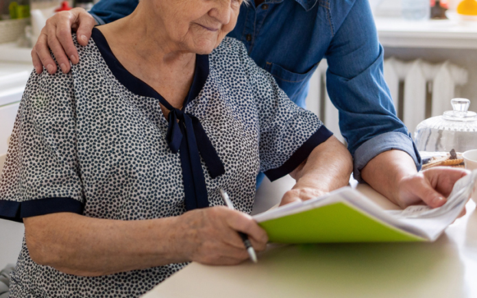 Purposeful Conditional Bequests elderly couple looking at paperwork