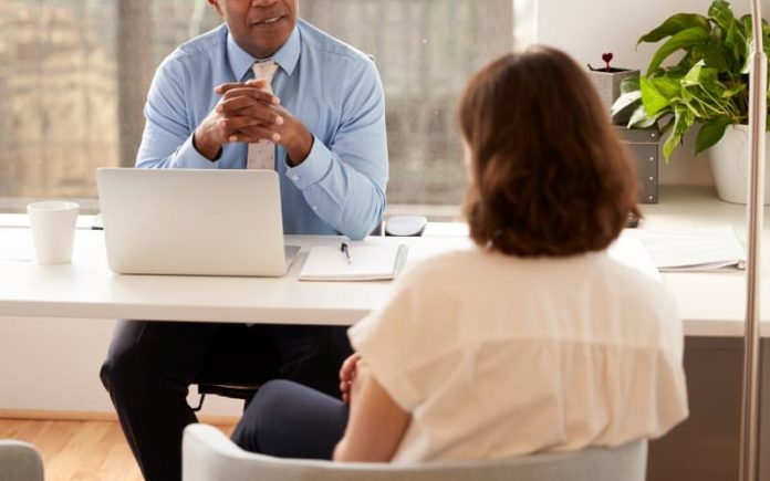 Young adult speaking with an attorney over their estate plan