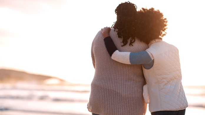 mother and daughter embracing