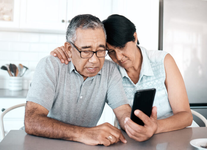 older couple on their phone