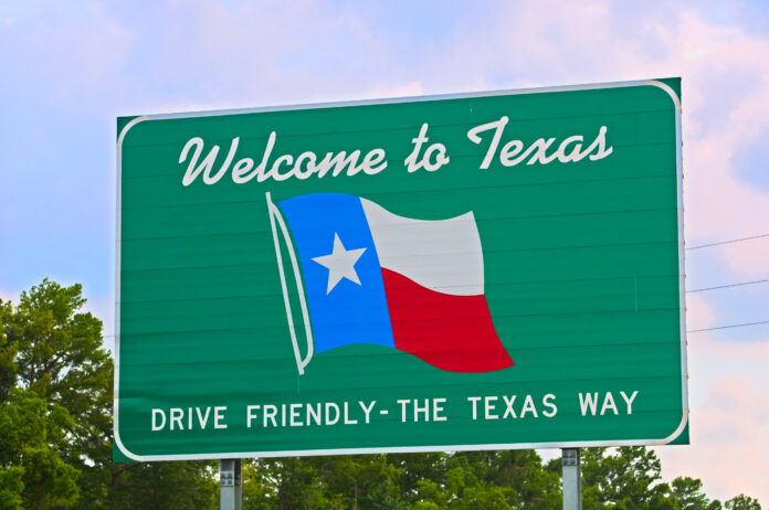 Texas Welcome Sign Texas welcome sign coming from the east on Interstate 10 with colored clouds