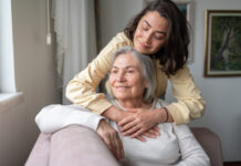 Daughter Hugging Senior Mother For Love Bonding Together